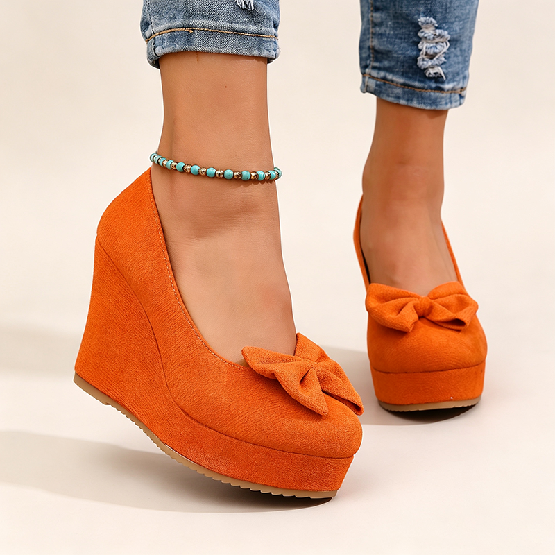 Women's ultra-high wedge-heel platform slip-ons with bow detail