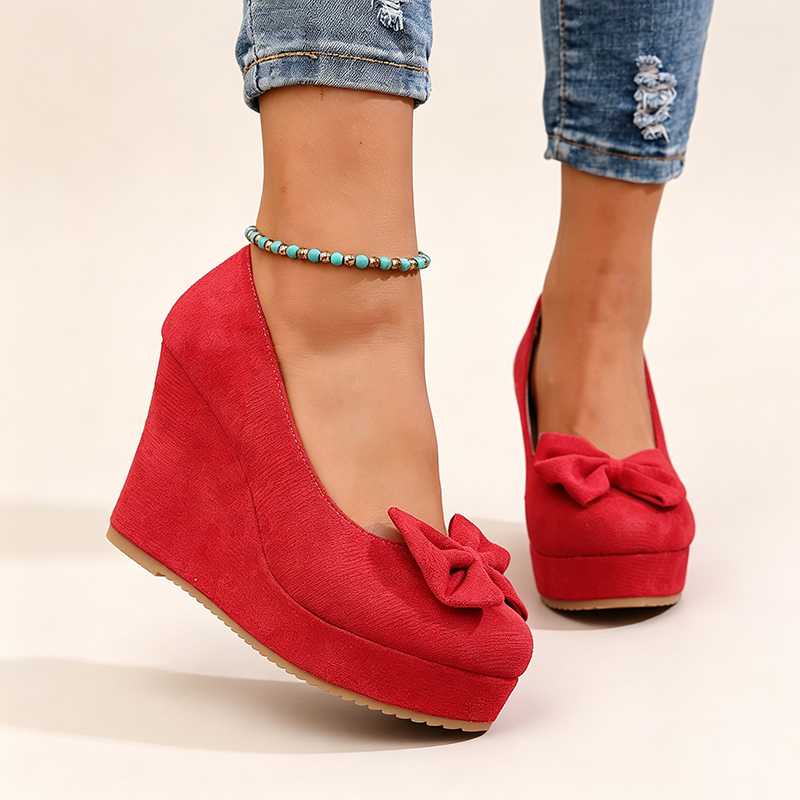 Women's ultra-high wedge-heel platform slip-ons with bow detail