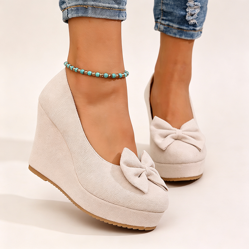 Women's ultra-high wedge-heel platform slip-ons with bow detail